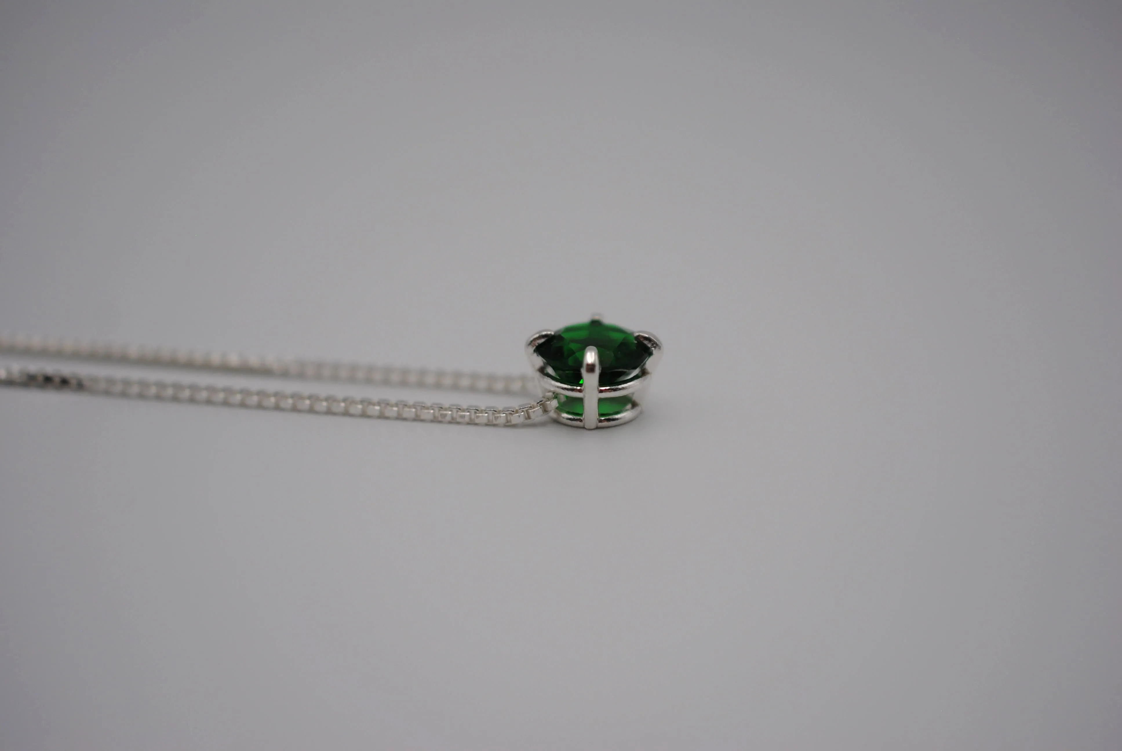 Birthstone Necklace: Round Emerald, Silver Prong Setting, Adjustable Chain