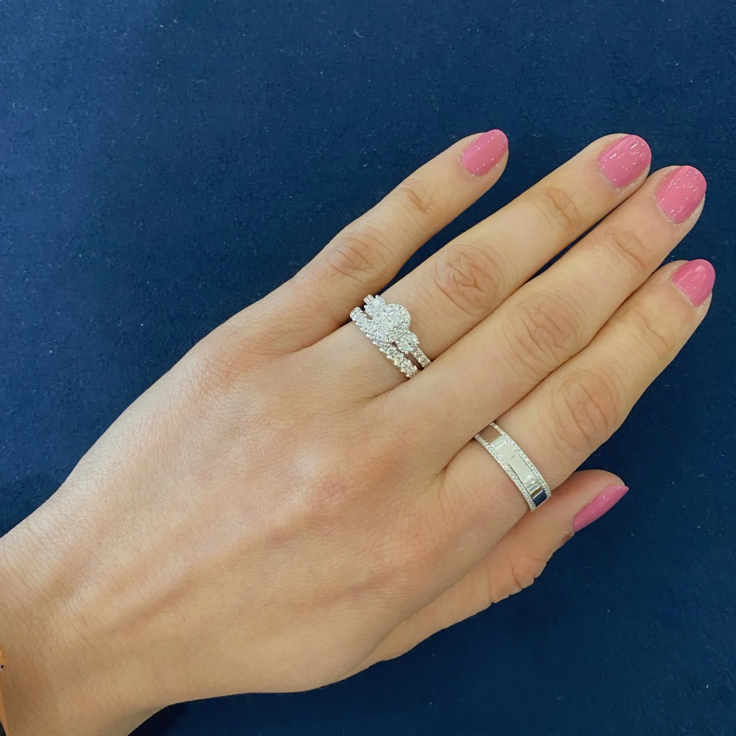 Oval Diamond Halo Three-Stone Engagement Ring
